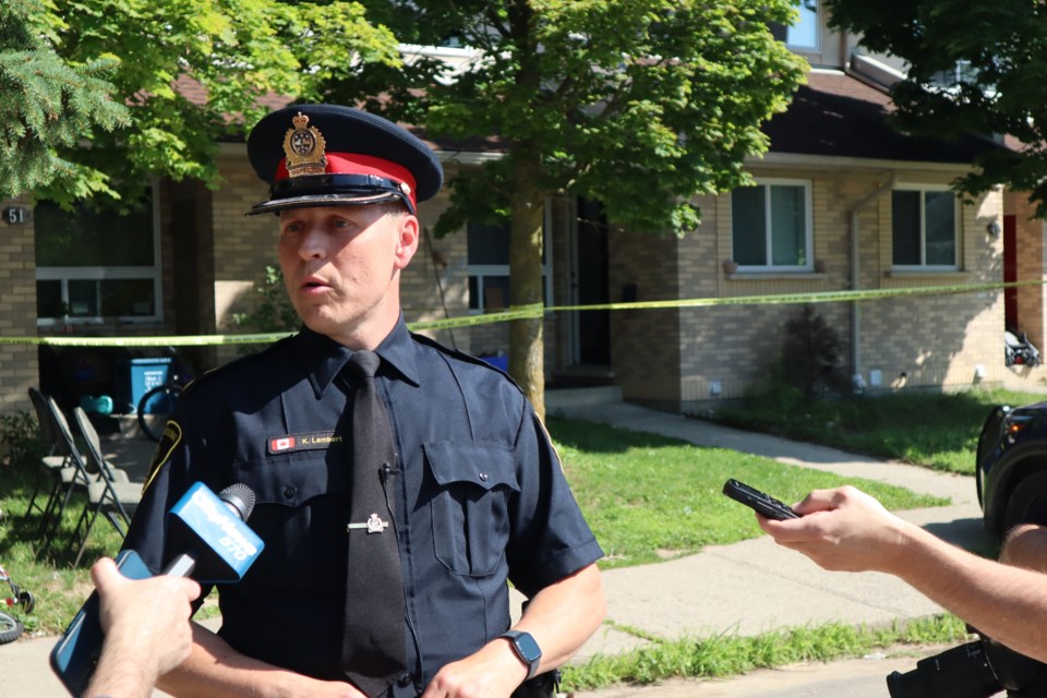 Waterloo Regional Police Service insp. Kyle Lambert speaks to media outside of a home where a shooting occurred