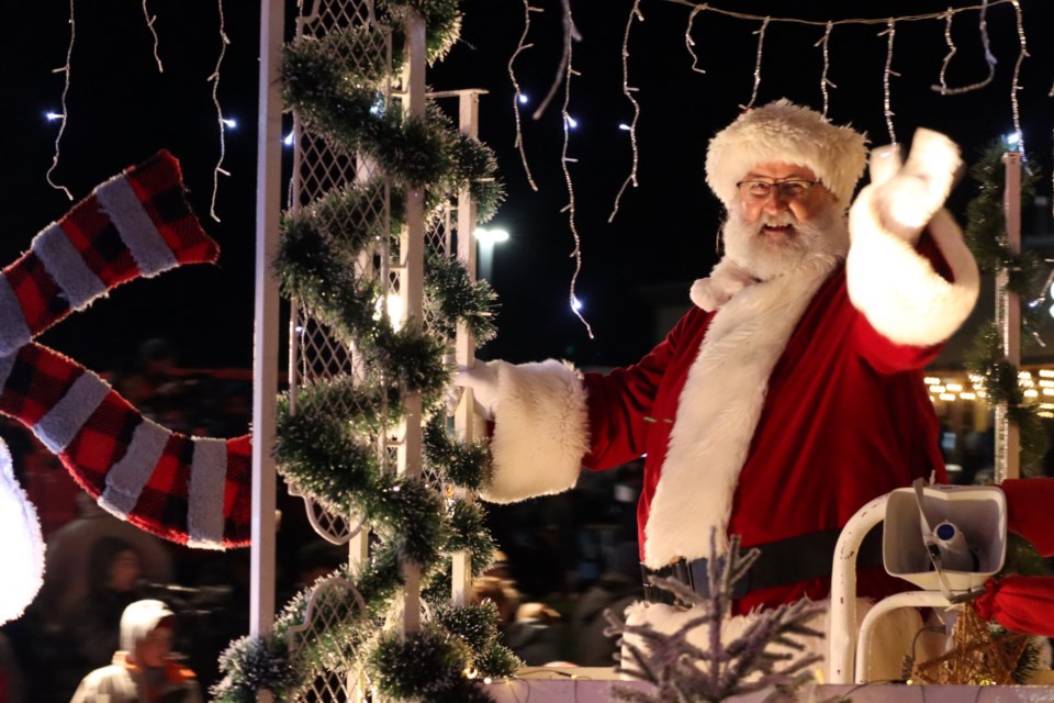 Thousands of people lined Hespeler Road on Saturday night to see the return visit from jolly old elf himself and the official kick off of the holiday season in Cambridge.