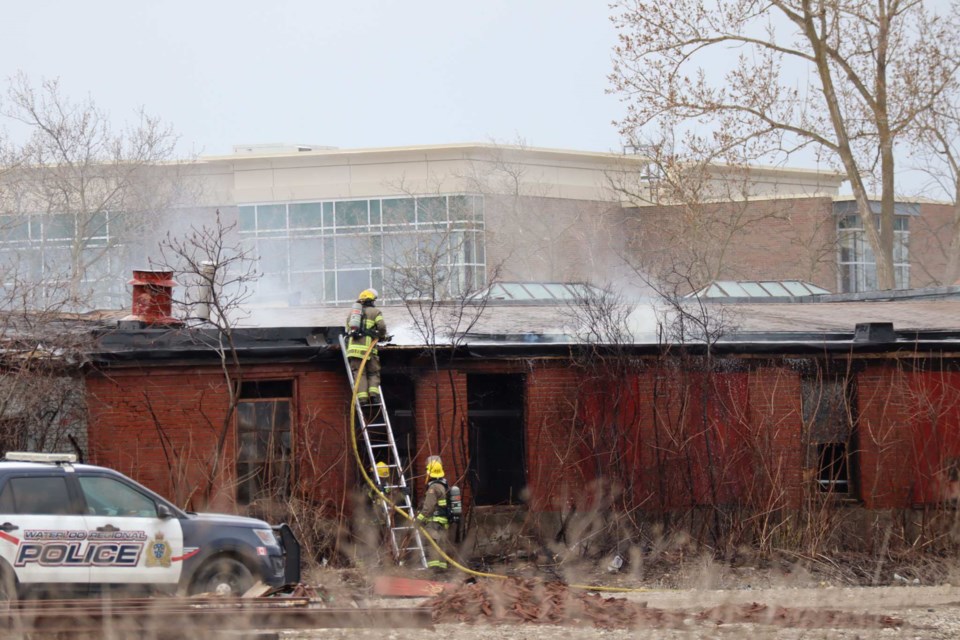 Cambridge firefighters battle a stubborn blaze in a warehouse off Dundas Street on Monday.