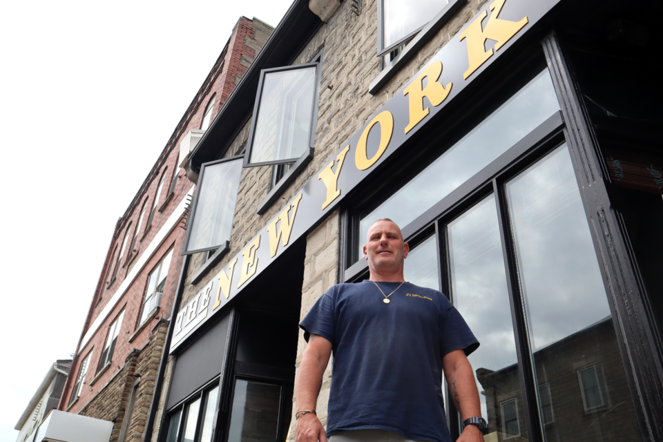 Jason York stands outside his new restaurant at 19 Queen Street in Hespeler. After years of wanting to own a pub and restaurant, the long-time village resident is realizing his dream this weekend.