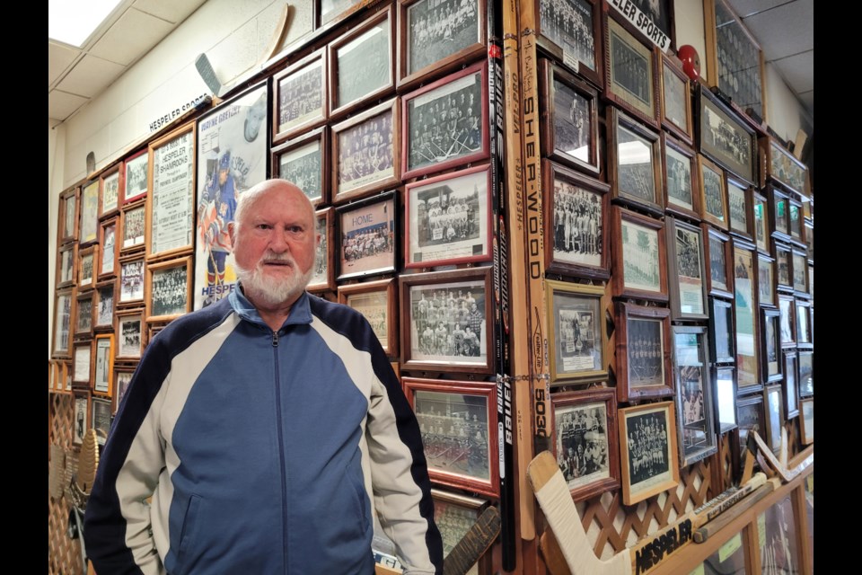 Hespeler Heritage Centre executive chairperson Lawrence Turner stands surrounded by a visual history of Hespeler. Located in the old Town Hall in downtown Hespeler Village, the centre has become home to an archival collection that consists of over 5,000 pieces of old photos, documents, memorabilia, and artifacts.