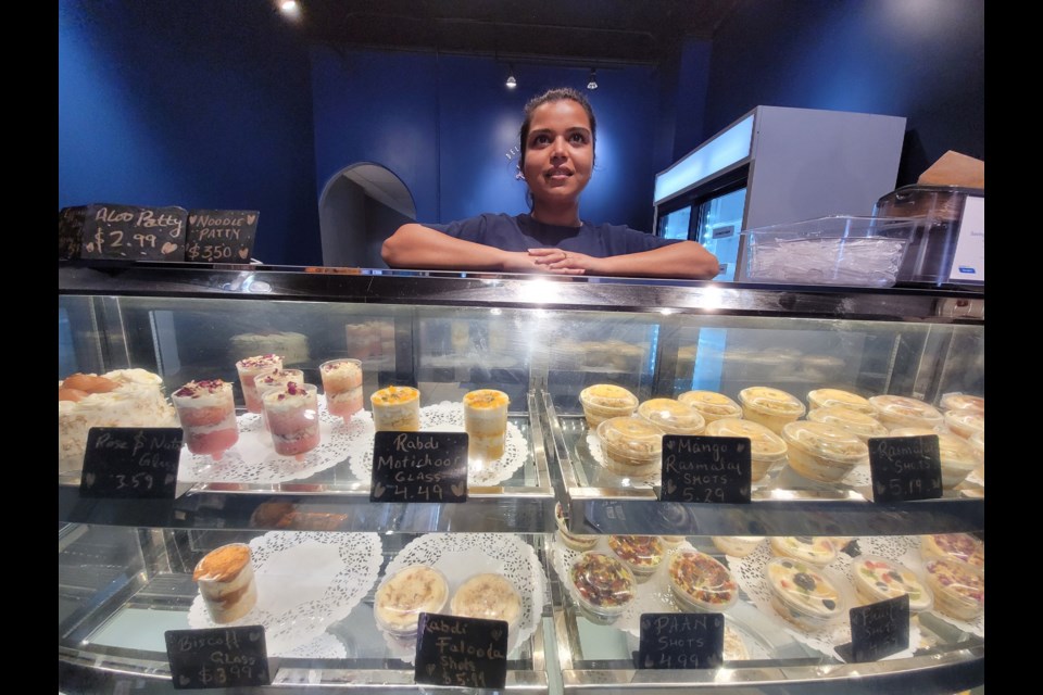 Owner of Layers of Joy, Manisha Manisha, offers take out cake shots at her Main Street Indian bakery.