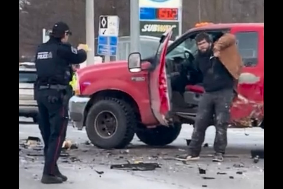 A Waterloo regional police officer subdues a man using a conducted energy weapon after the man attempted to flee a traffic stop and collided with another vehicle, resisted arrest and approached the officer with a hatchet. 