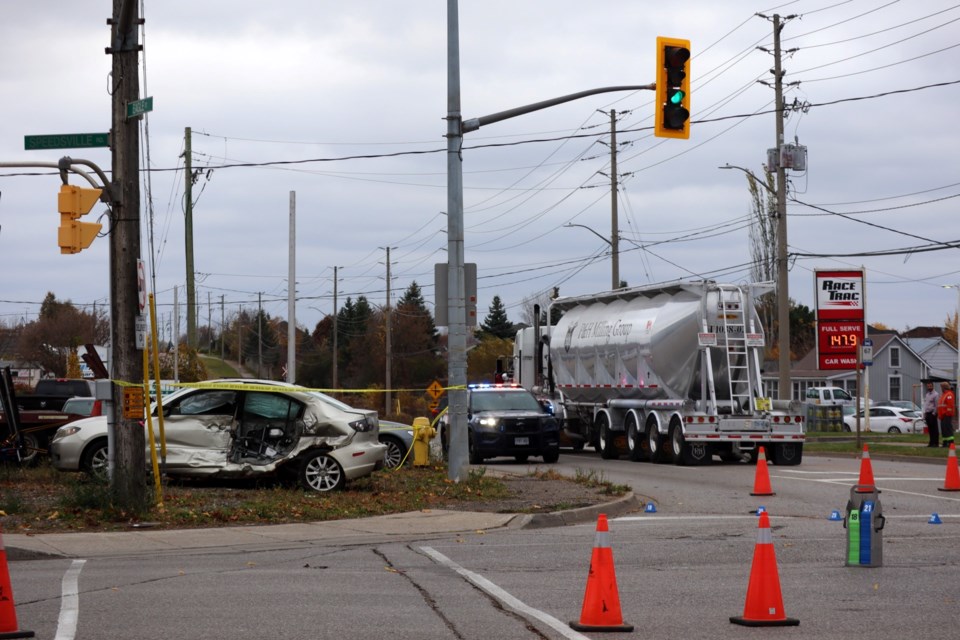 A Mazda sits on the corner of Speedsville Road and Eagle Street North after it was struck by a transport around 9:20 a.m. this morning. Police confirmed the 80-year-old driver died at the scene. The P & H Milling tanker appears to have been heading north on Eagle Street when the collision occurred in the intersection.