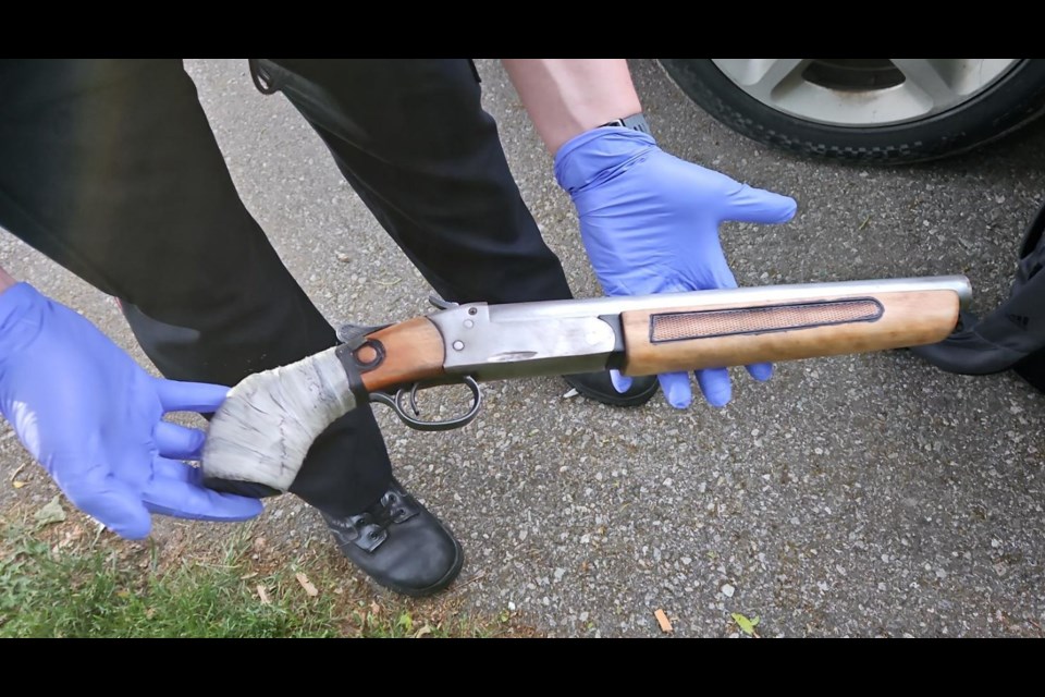 A shotgun seized by police following a traffic stop in Cambridge.