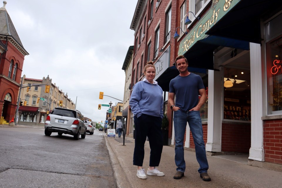 Siblings Carrie Peart and Ted Drew-Smith co-own Reids Chocolate Candy & Nut Shop which has operated on Ainslie Street since 1981. They're opposed to a plan to eliminate about 18 on-street parking spots to accommodate cycle tracks along the street as part of reconstruction in 2026.