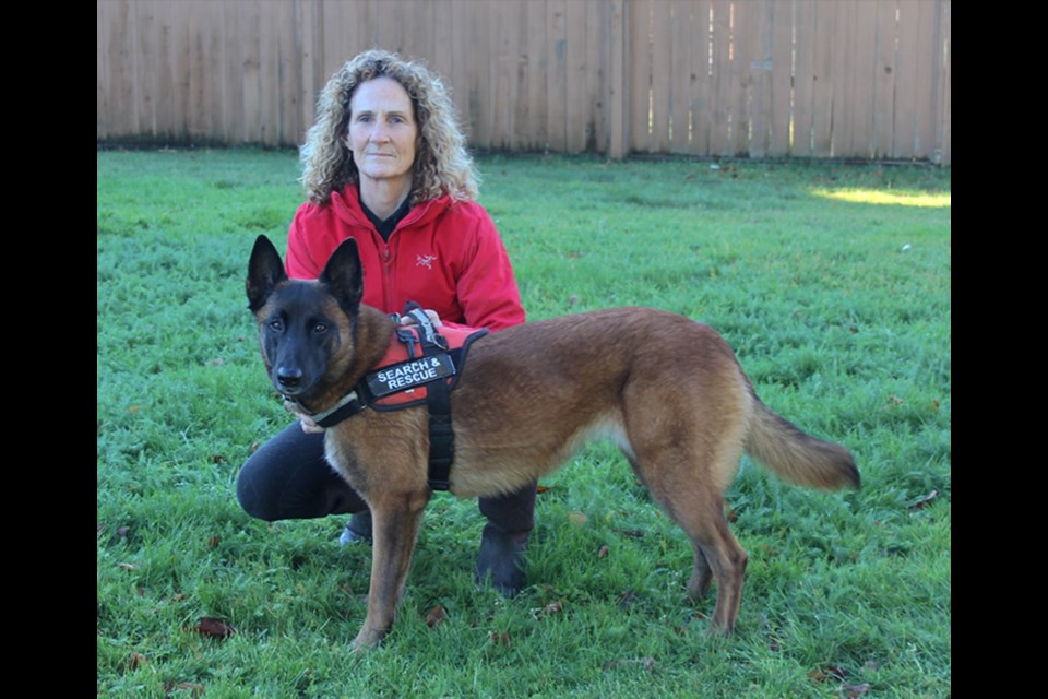 Joyce Tattersall of Sunshine Coast Search and Rescue with her search dog Echo.