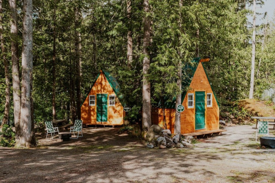 Four A-frame cabins are available to book individually or as a group.