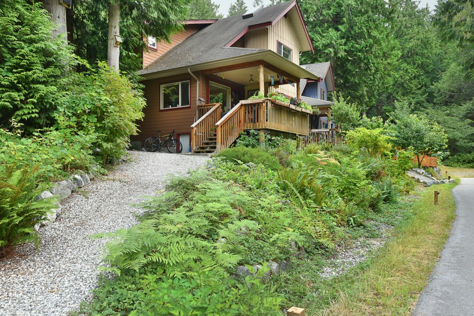 The houses are all designed by Mobius Architecture of Sechelt and clad with hardie board siding and cedar batten.