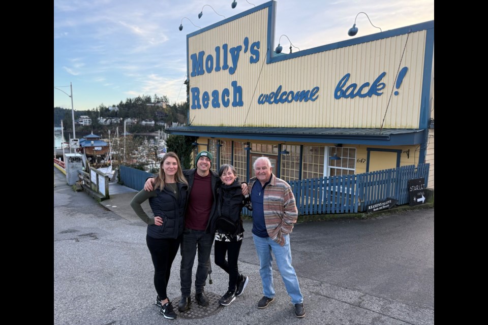 Siblings David and Becca Bristow (L) with Molly's Reach owners Lynn and John Smith, outside of Molly's Reach, Jan. 6.