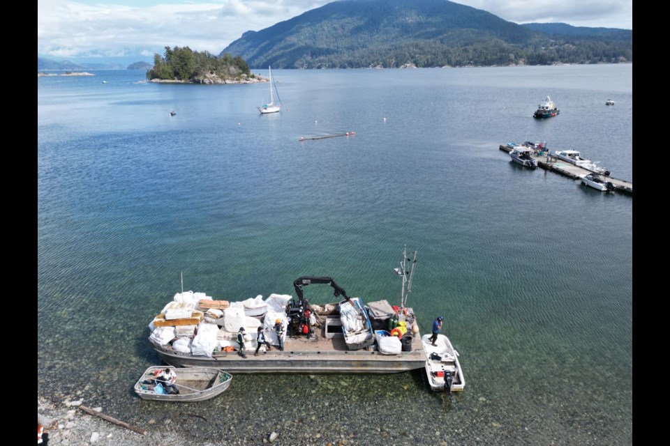 A full barge of marine debris collected in the waters around Pasley Island. 