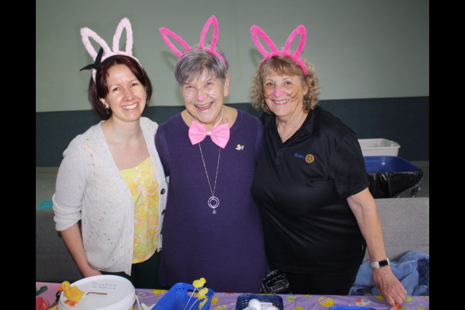 Ashley LeBlanc, Jan Gillis, and Shirley Hall volunteered at the craft table.