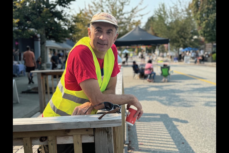 Car Free Day organizer Martin Prestage enjoying the results of all of the hard work by TraC staff and volunteers in creating the free, family friendly festival on Cowrie Street, Sept. 7.