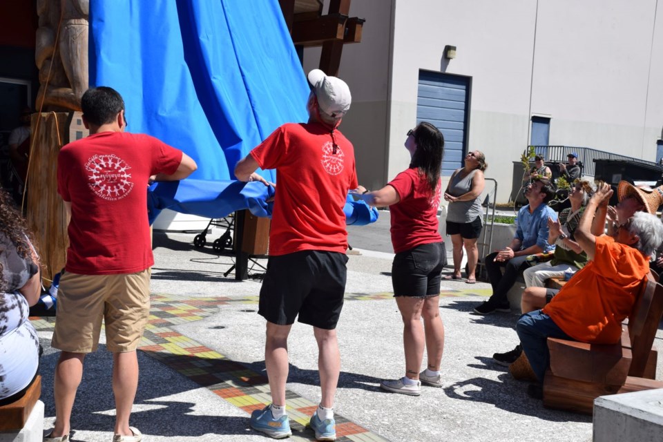 The unveiling of the Reconciliation Pole at Reconciliation Plaza, July 6.