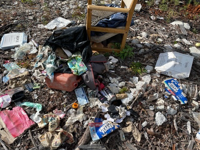 Remnants of the garbage that has been illegally burnt in Roberts Creek.