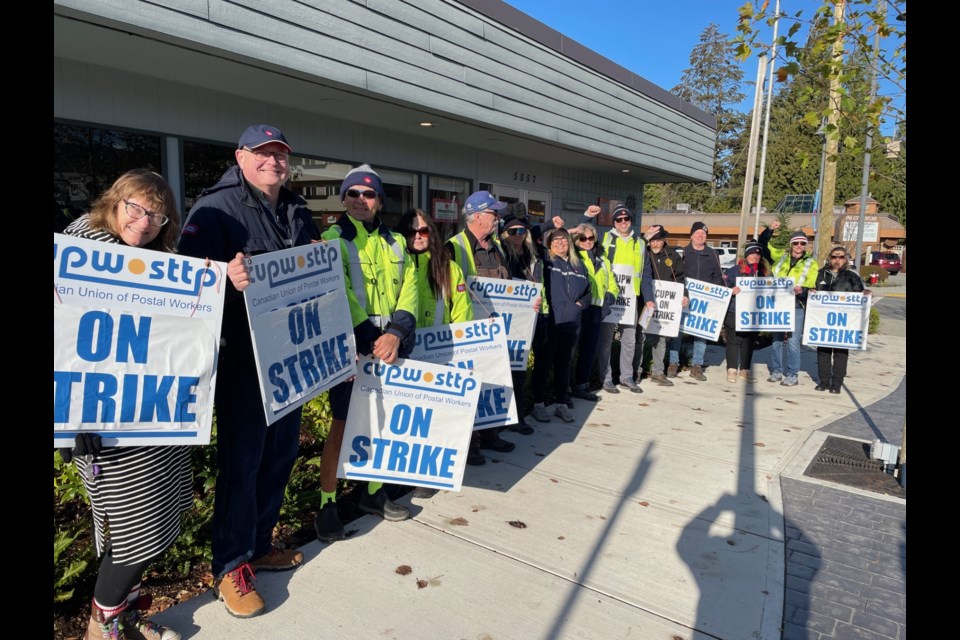 Members of the Rural Suburban Mail Carriers Union of Canada Post, picketed outside of the Sechelt post office Nov. 15