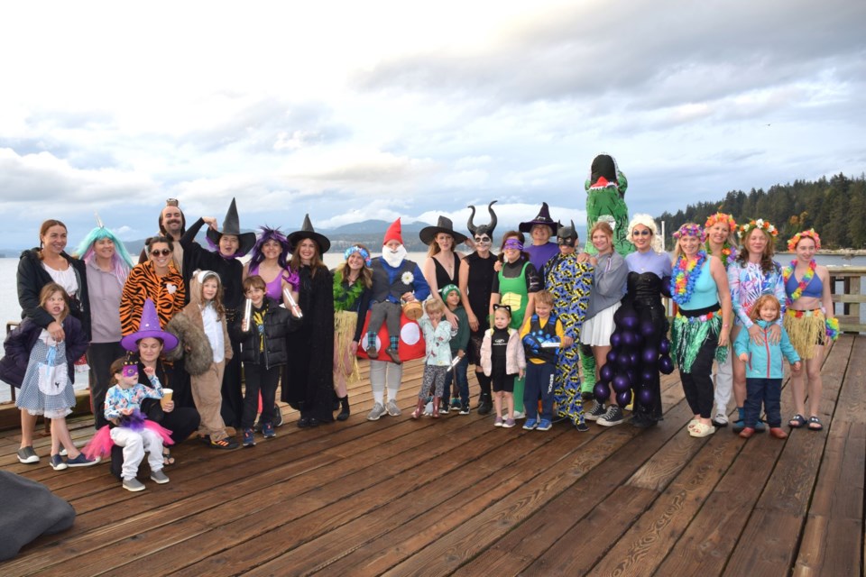 Courageous swimmers came out in costume for the Blue Titty fundraising swim at Davis Bay. 