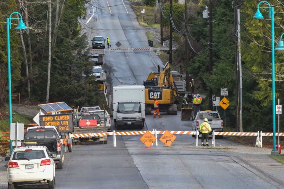 Crews working to fix the washout along Reef Road on Jan. 30.