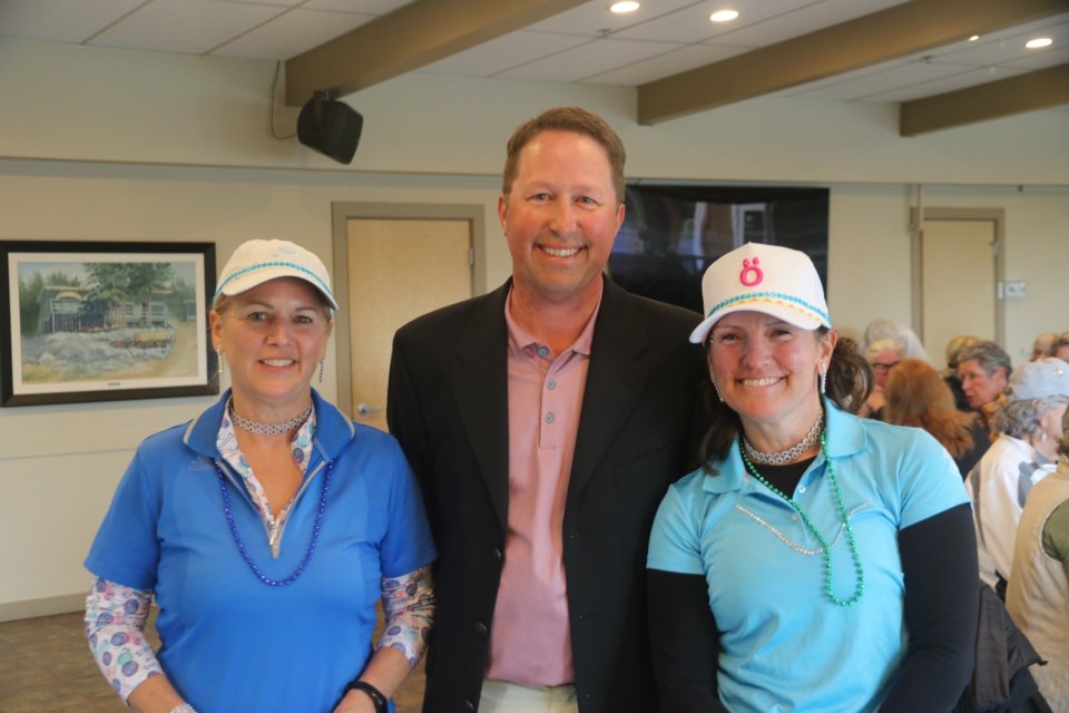 Mel Chernoff and Tracey Buehler with head pro, Jim Pringle.
