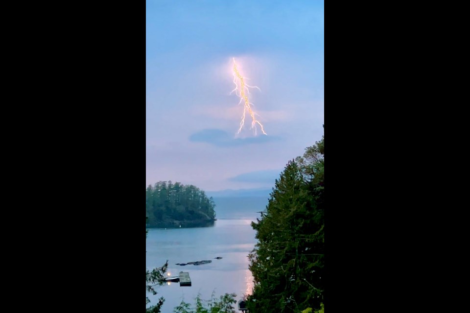 Lightning forked over the Salish Sea on Monday evening, Aug. 28. 