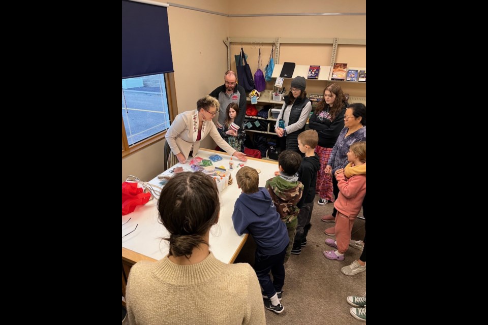 Otipemisiwak Rocky View District Captain Amber Boyd hosted a Métis Fish Scale Art Workshop at Cochrane Public Library to mark Louis Riel Day on Nov. 16.