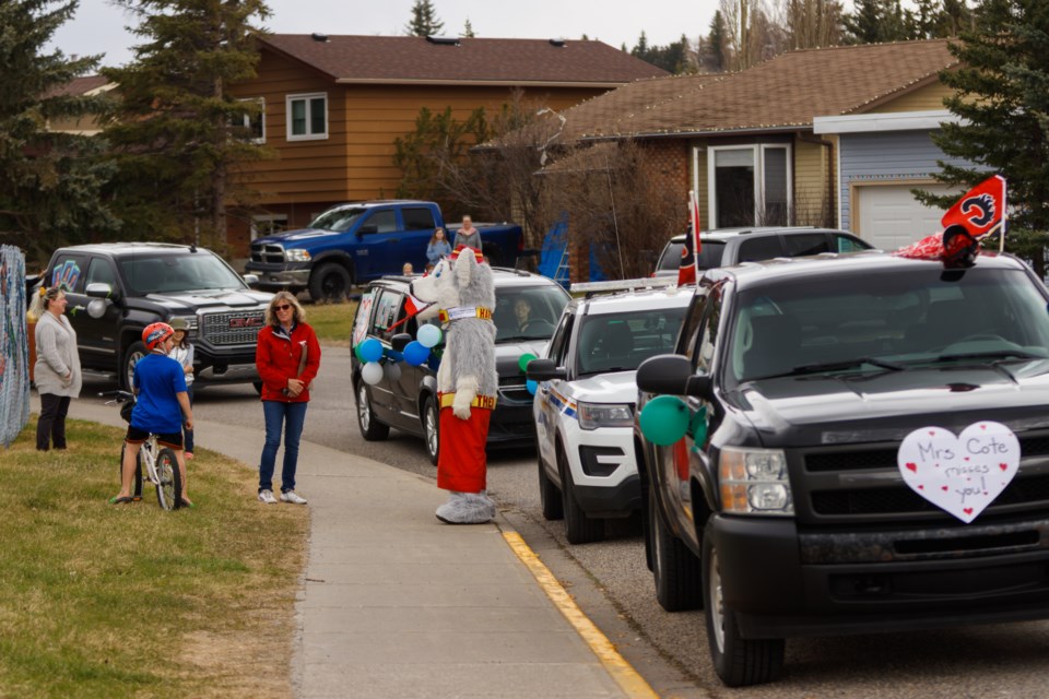 Glenbow School staff host a car parade to celebrate their students on Thursday (May 7). The first group of teachers began their parade at Glenbow School and travelled through Glenbow to Riverview and over to the West Valley/Terrace/Point areas. A second group of participants kicked off their parade at the Bow Meadows soccer field parking lot and travelled through Bow Meadows, the Crawford Ranch area, Bow Ridge, Jumping Pound, Fireside and finished in the River Heights area. (Chelsea Kemp/The Cochrane Eagle)