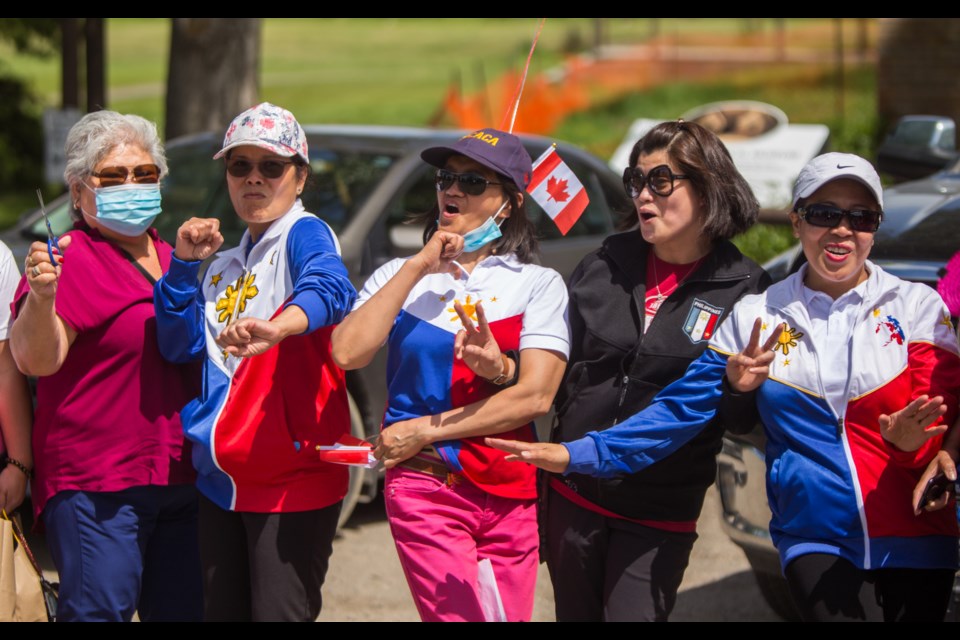 The Filipino Canadian Association of Cochrane gathers together to celebrate Philippine Independence Day with a car parade on Friday (June 12). (Chelsea Kemp/The Cochrane Eagle)