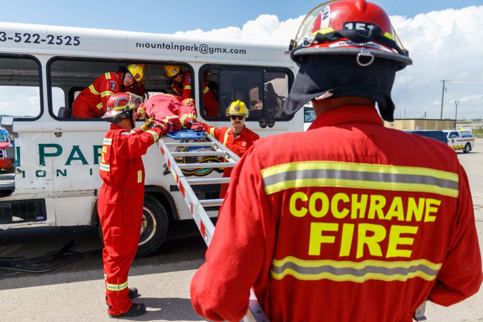 Cochrane Fire Services engage in advanced vehicle extraction training at the Town Lagoon on Thursday, July 23, 2020. The training serves to keep crews up-to-date on current tools and techniques they can deploy when responding to emergency calls. (Chelsea Kemp/The Cochrane Eagle)