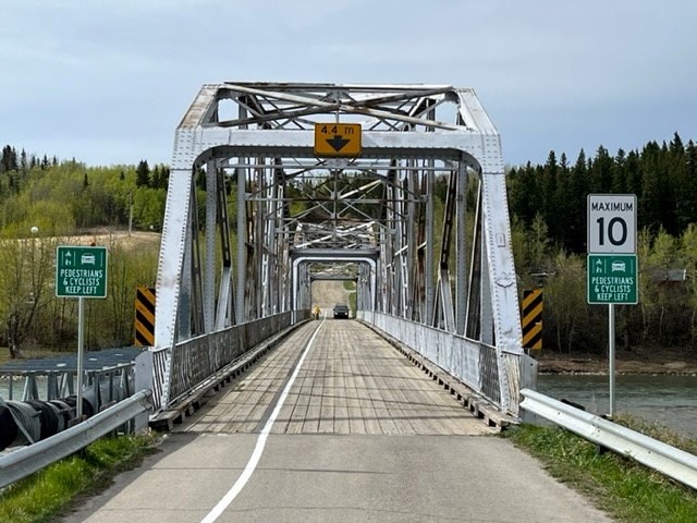 The Town of Cochrane lowered the speed limit and opened a pedestrian and bike lane on River Ave. bridge May 26. (Facebook/Town of Cochrane)