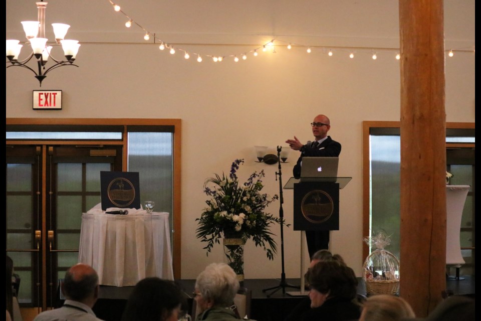 Cochrane Mayor Jeff Genung delivers the State of the Town address to a crowd of about 100 people at the RancheHouse June 9. (Jessica Lee/The Cochrane Eagle)