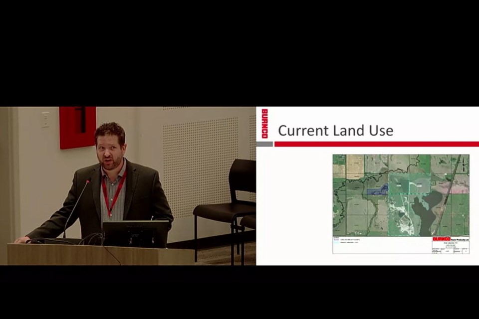 Travis Coates, Burnco land and resource manager, presents a proposal to RVC in a July 26 council meeting requesting to return a closed gravel pit near Irricana to operations under the company's ownership. (Screenshot)