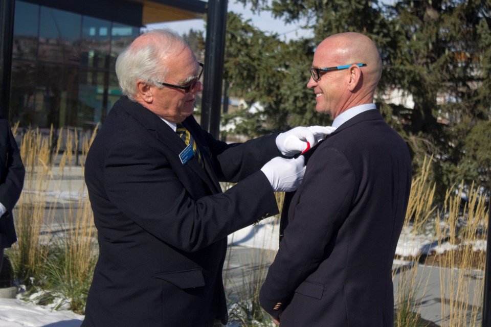 To kick off this year's poppy campaign in the community, The Royal Canadian Legion Branch No. 15 presented the first poppy to Mayor Jeff Genung, alongside raising their flag at The Station on Oct. 27