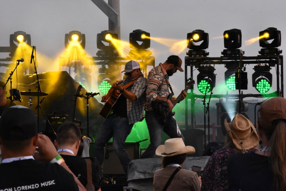 Brandon Lorenzo and his guitarist on stage at the Bow Valley Boot Stomp 2024 at the Cochrane & District AG Society on Friday, June 19.