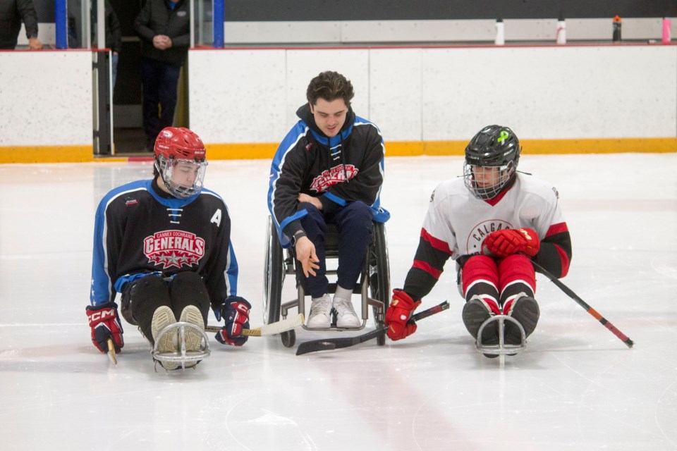 Humboldt Bronco Bus Crash survivor Ryan "Straz" Straschnitzki dropping the first puck of the game for the 2nd annual Charity Sledge Hockey Game on Jan. 24.