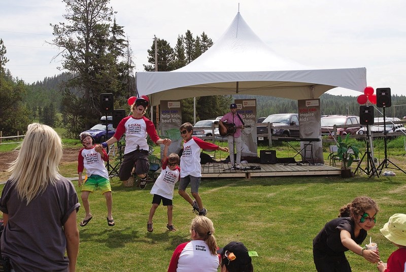 Kids celebrate the opening of Camp Kindle in 2012.