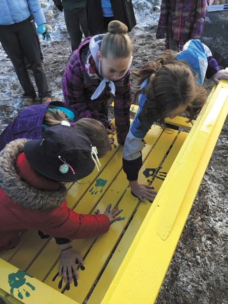 Holy Spirit School has a new “;Buddy Bench”donated by Cochrane 3rd Girl Guides. The bench is a place for students to go when they&#8217;re in need of comfort and support from 