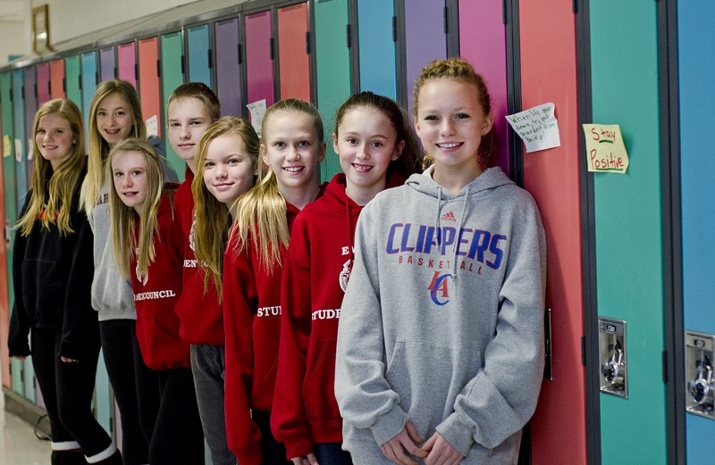 Manachaban Middle School&#8217;s student council, the group behind the positive message project where every locker receives a sticky note with a compliment or inspiring