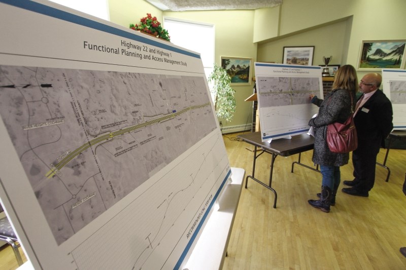 An ISL Engineering representative chats with a member of the public, Jan. 31 at the Springbank Heritage Club. The group was presenting options for future upgrades to Hwy. 22