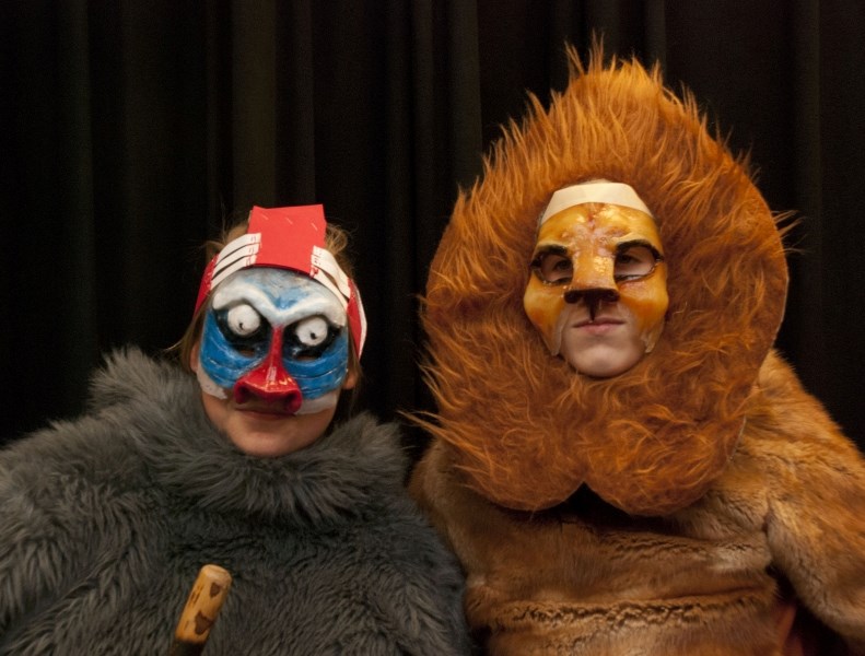 Bow Valley High School students Emily Wiberg (left), who plays Rafiki, and Ty Duke, who plays Simba, put on their game faces during rehearsal for The Lion King. The musical,