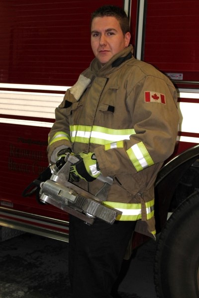 Redwood Meadows Emergency Services Captain Gary Robertson displays the Jaws of Life rescue tool at the Redwood Meadows Fire Station. The RMES is hosting a Fire Cadet Camp