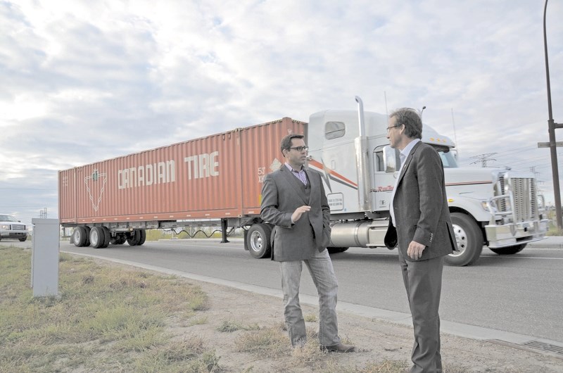 MLA Bruce McAllister (left) and Wildrose infrastructure critic Drew Barnes took a first-hand look at Highway 8 as part of their province-wide tour.