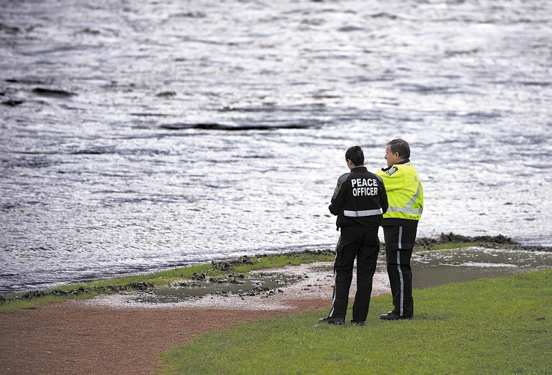 Cochrane peace officers monitored the Bow River June 20 in Cochrane.