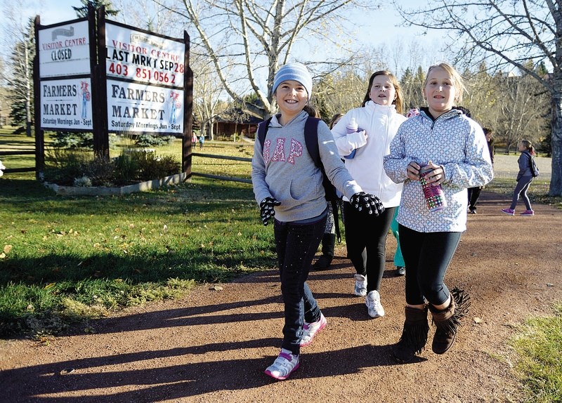 From left: Manachaban Middle School students Tegan Leonard, Chloe Deeves and Claire Malcolm partake in last year&#8217;s Walk-A-Thon.