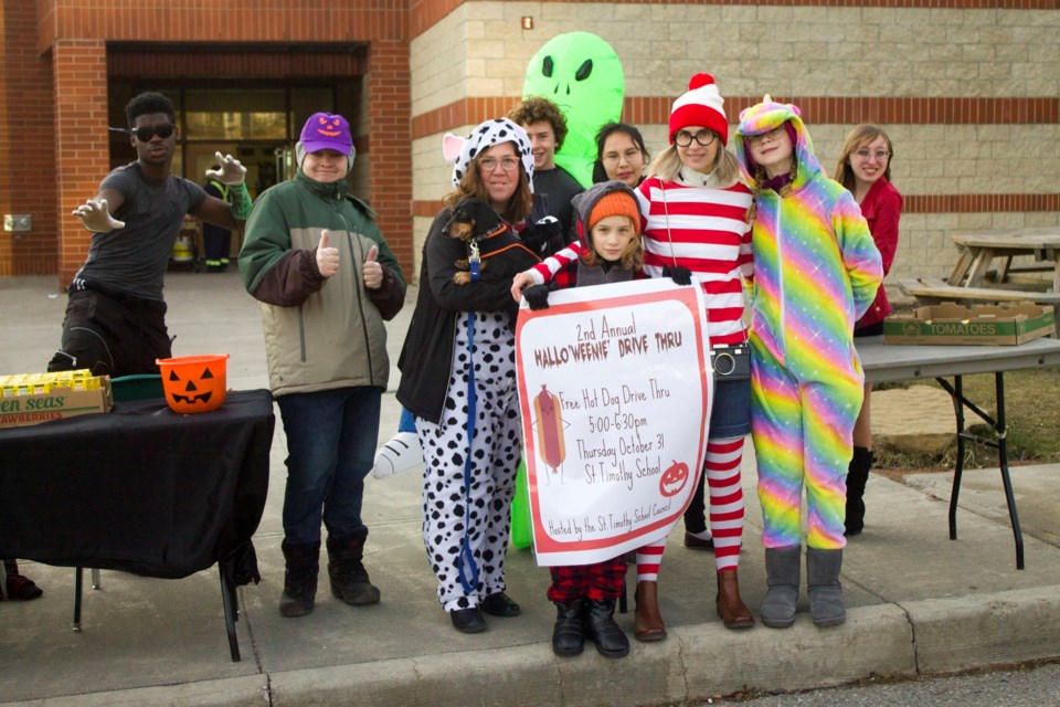 Students, staff, and parents from St. Timothy School hosted their second annual Halloweenie Drive-Thru BBQ on Oct. 31.