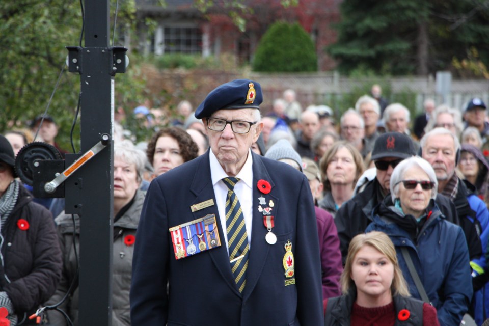 A veteran of the Merchant Marines and Collingwood Legion member, Don Wilcox watches the wreath-laying service. Remembrance Day, Collingwood, Nov. 11, 2024. 