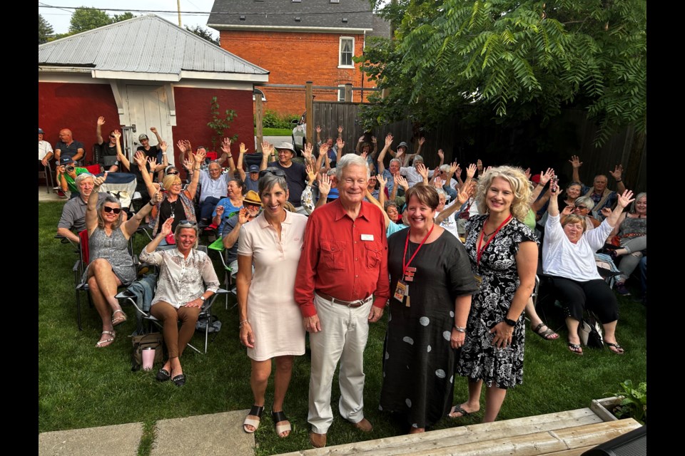 Deborah Bloom Hall from the Ontario Trillium Foundation with David McFadden, Erica Angus, and Valerie O'Brien of Theatre Collingwood, celebrate the announcement of a $62,400 grant for Theatre Collingwood from the Ontario Trillium Foundation. 