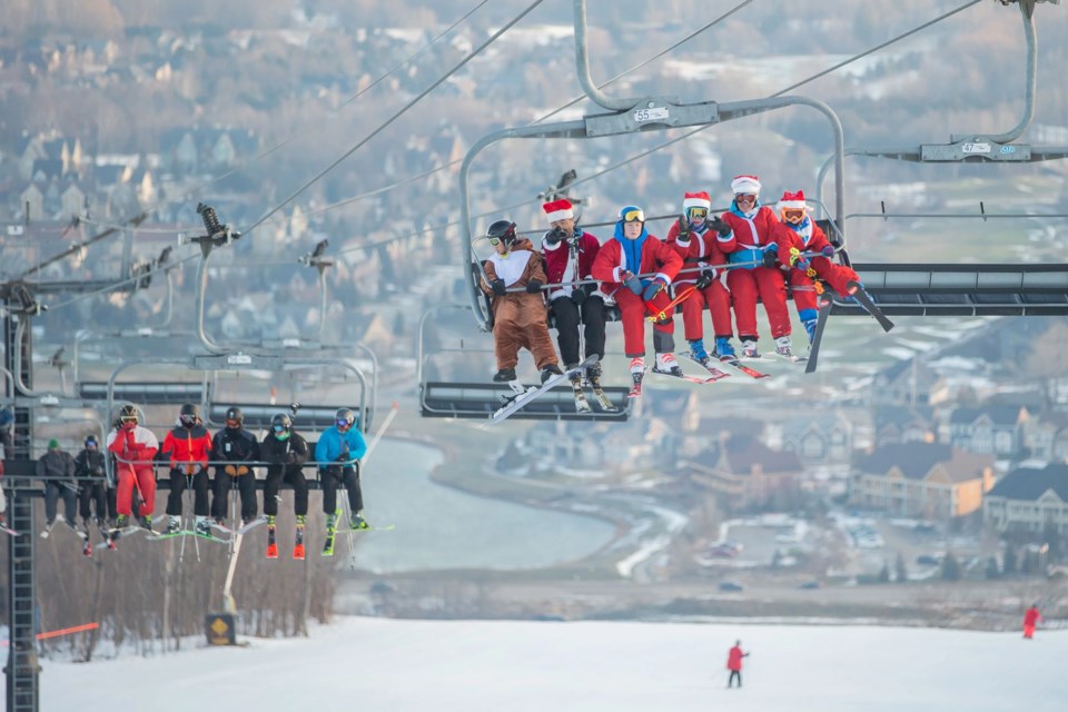 Blue goes red for annual Santa Ski - Collingwood News