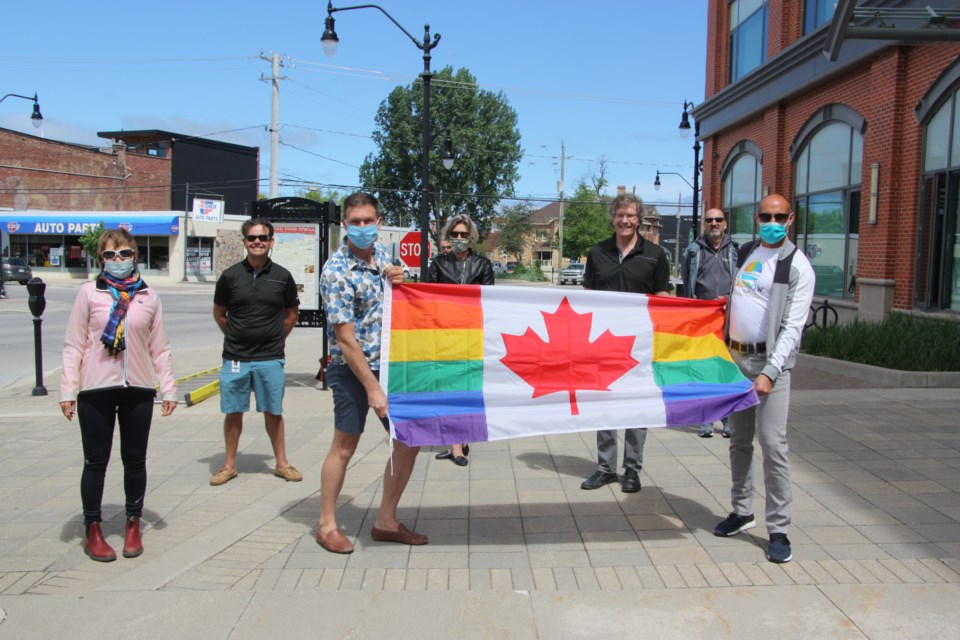 From left: Councillor Deb Doherty, Councillor Bob Madigan, Councillor Mariane McLeod, Mayor Brian Saunderson, Councillor Steve Berman, and Dr. John Miller at the Pride flag raising on June 12. Erika Engel/CollingwoodToday