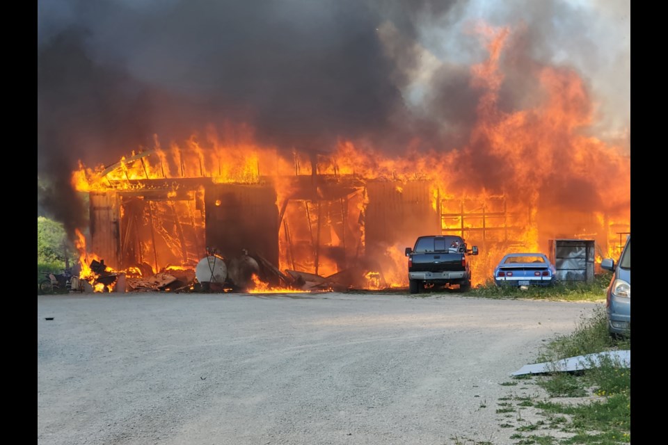 A fire consumed an equipment shed and all the heavy equipment and tools inside of it. The fire took place Tuesday, Aug. 25 starting around noon. Contributed photo