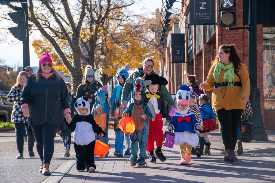 Families visited local businesses for trick-or-treating during the annual downtown Black Harvest Festival on Oct. 29. 